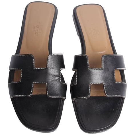 black hermes flats|Hermes flats for sale.